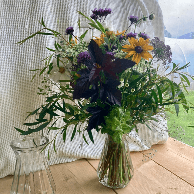 Funky glass vase filled with lovingly arranged Fresh Kerry Flowers 